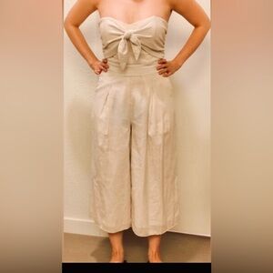 Anthropology Vera jumpsuit Cropped Wide Legs Front Bow Tie cream color size XS